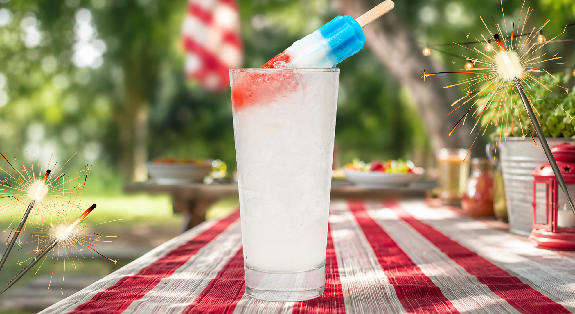 a glass of ice cream with a popsicle in it