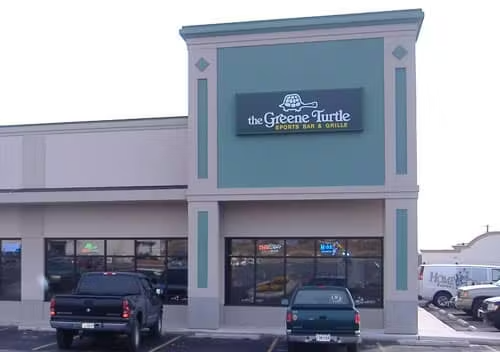 a car parked on the side of a building