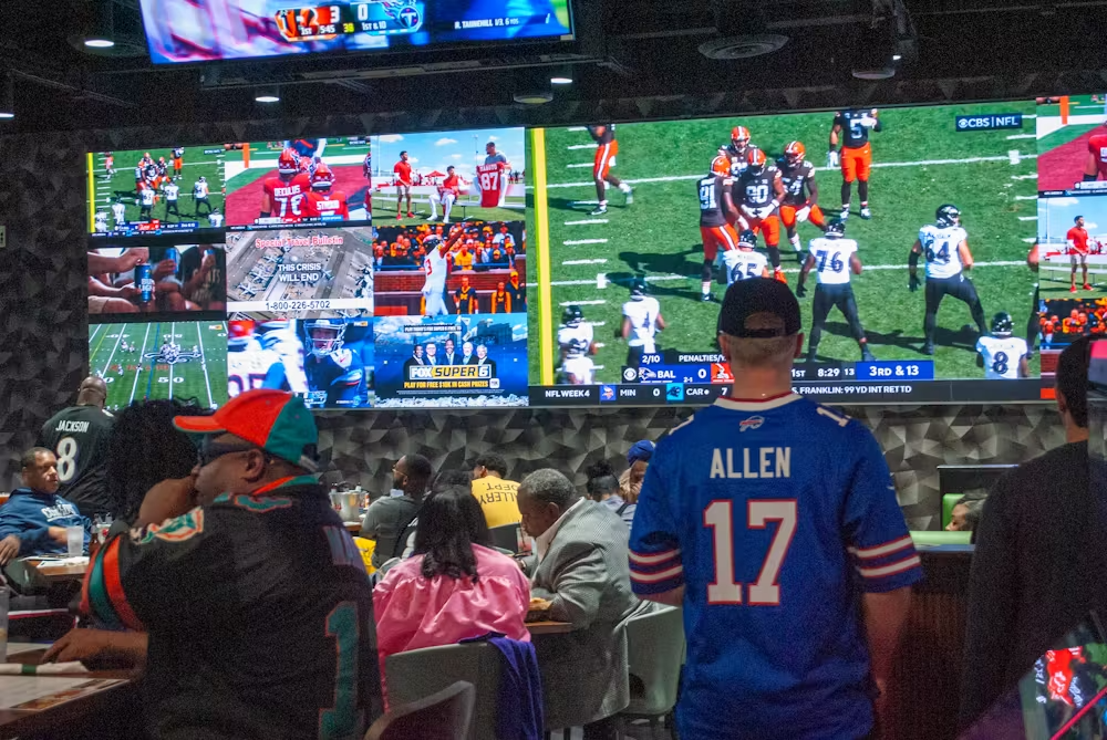 a group of people standing in front of a crowd