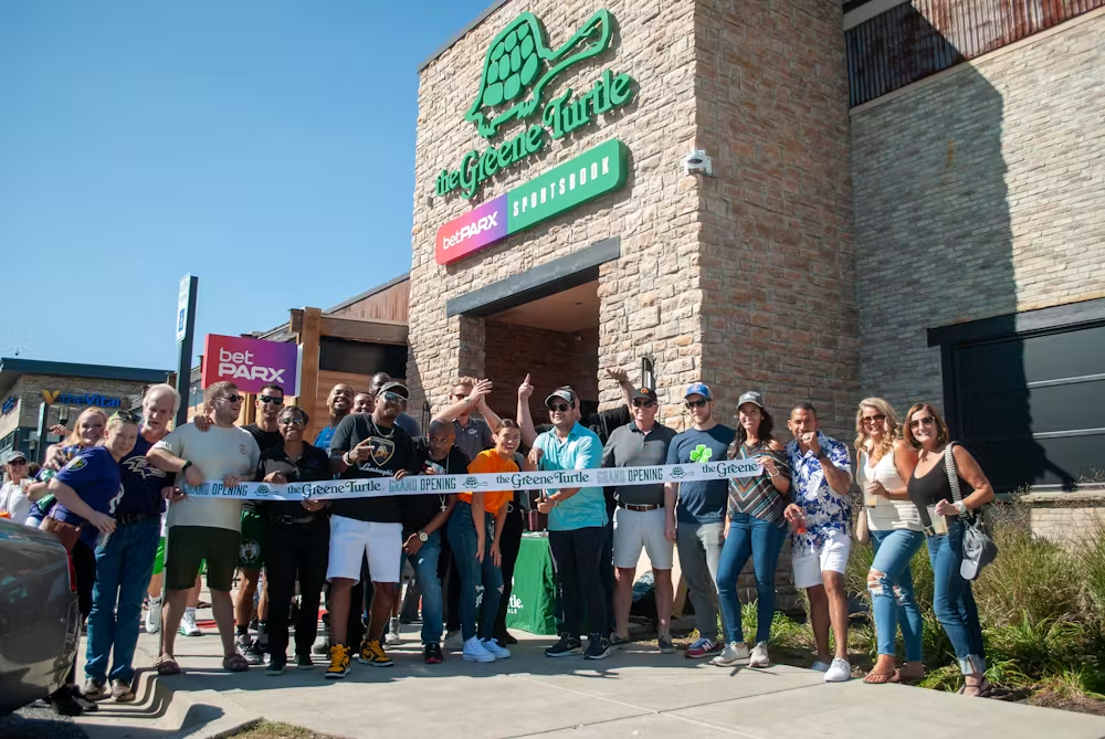 a group of people standing in front of a building