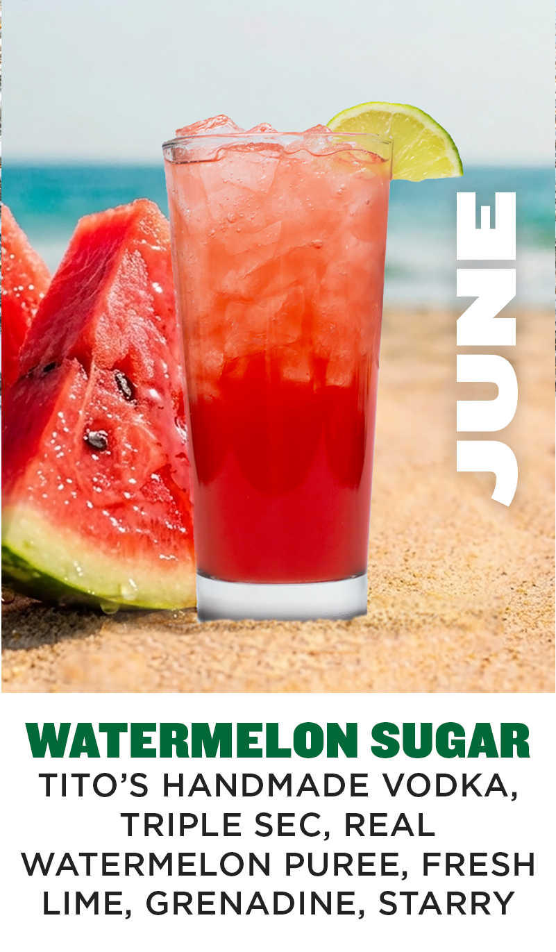 a glass of red liquid next to a slice of watermelon