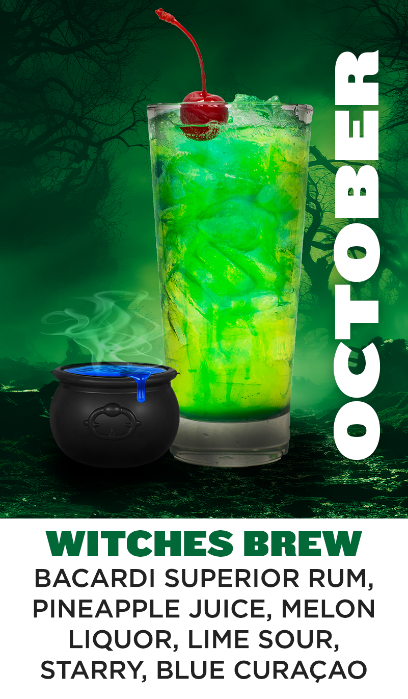 a green drink with a black pot