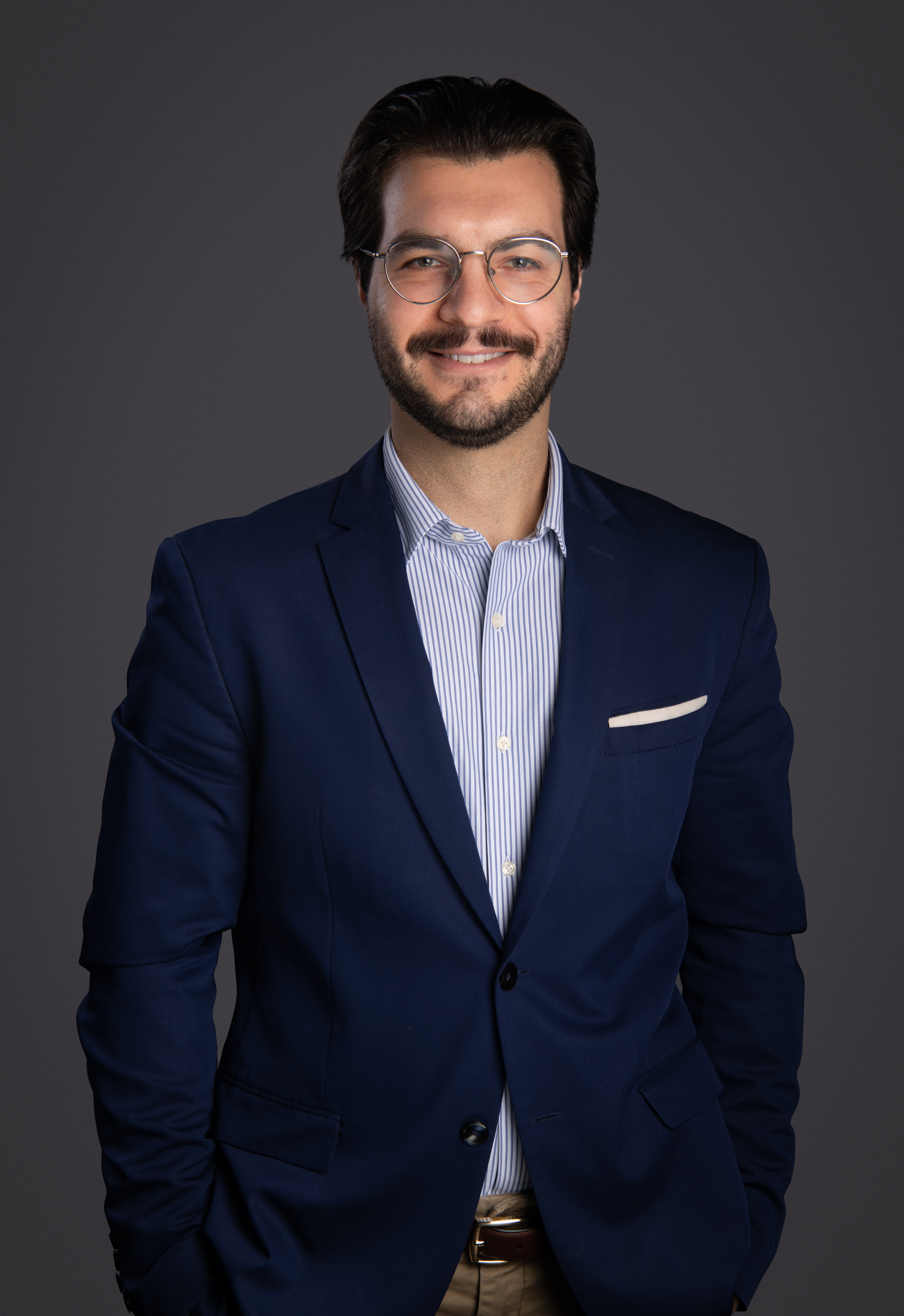 a man smilling for the camera