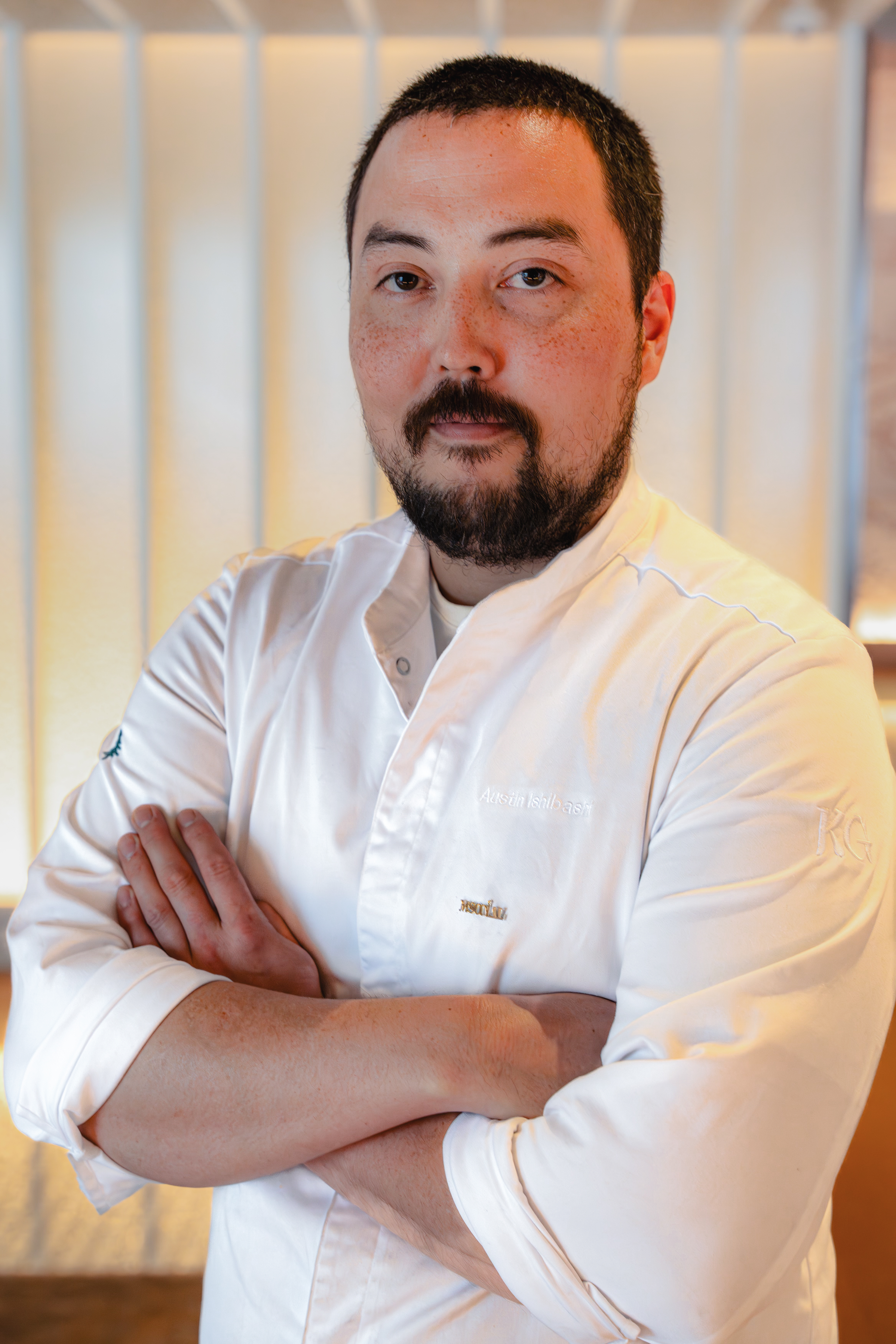 a man smilling for the camera