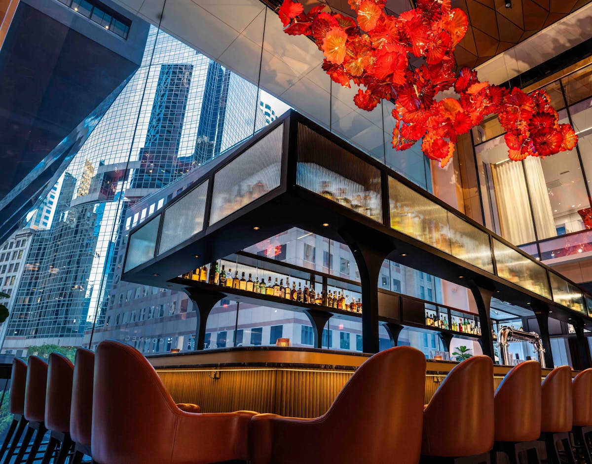 a room with a couch and table in a restaurant