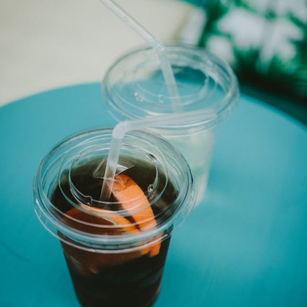 a glass with a blue cup