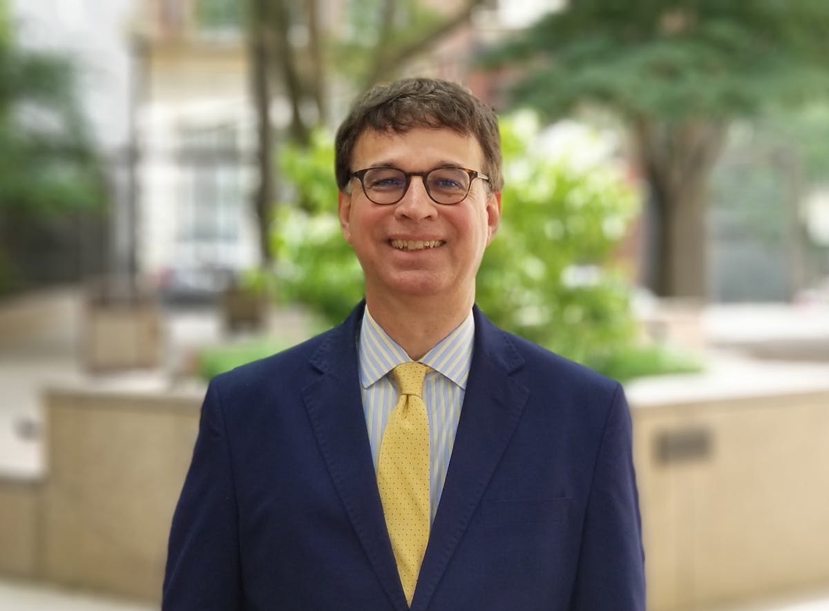 a man wearing a suit and tie