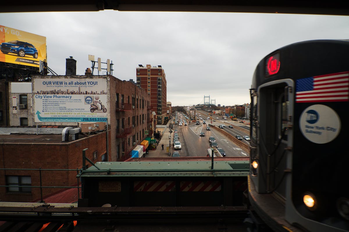 a train is parked on the side of a building