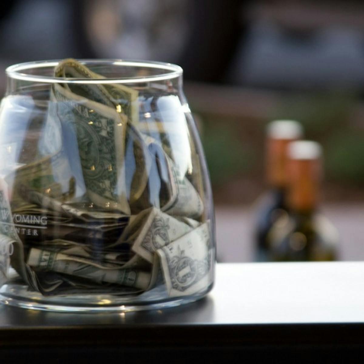 a close up of a glass cup on a table