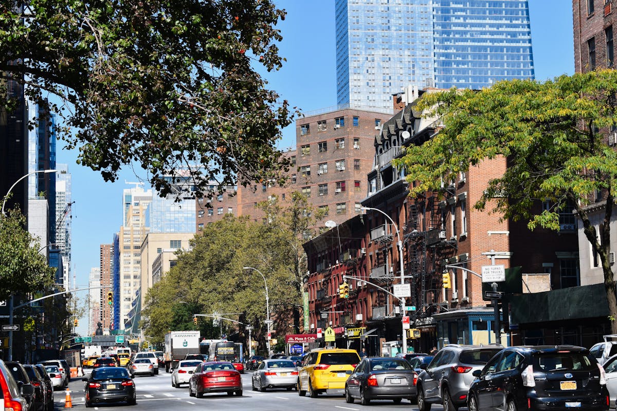 a car driving down a busy city street