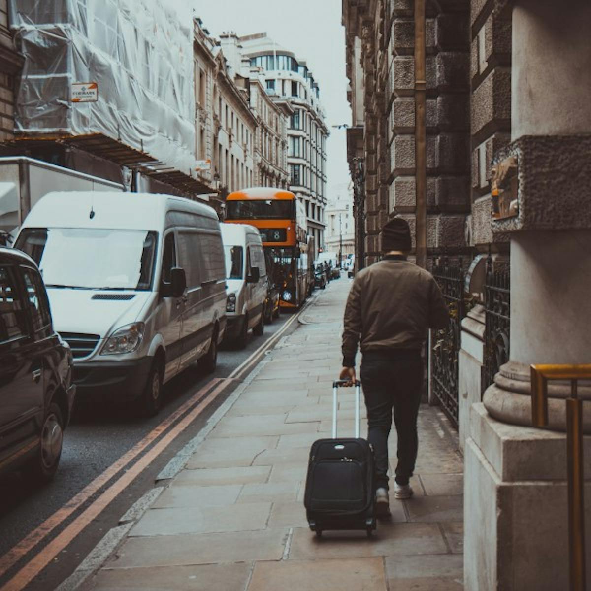 a person walking down a busy city street