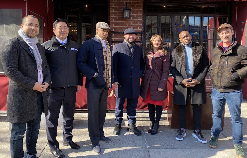 a group of people posing for the camera