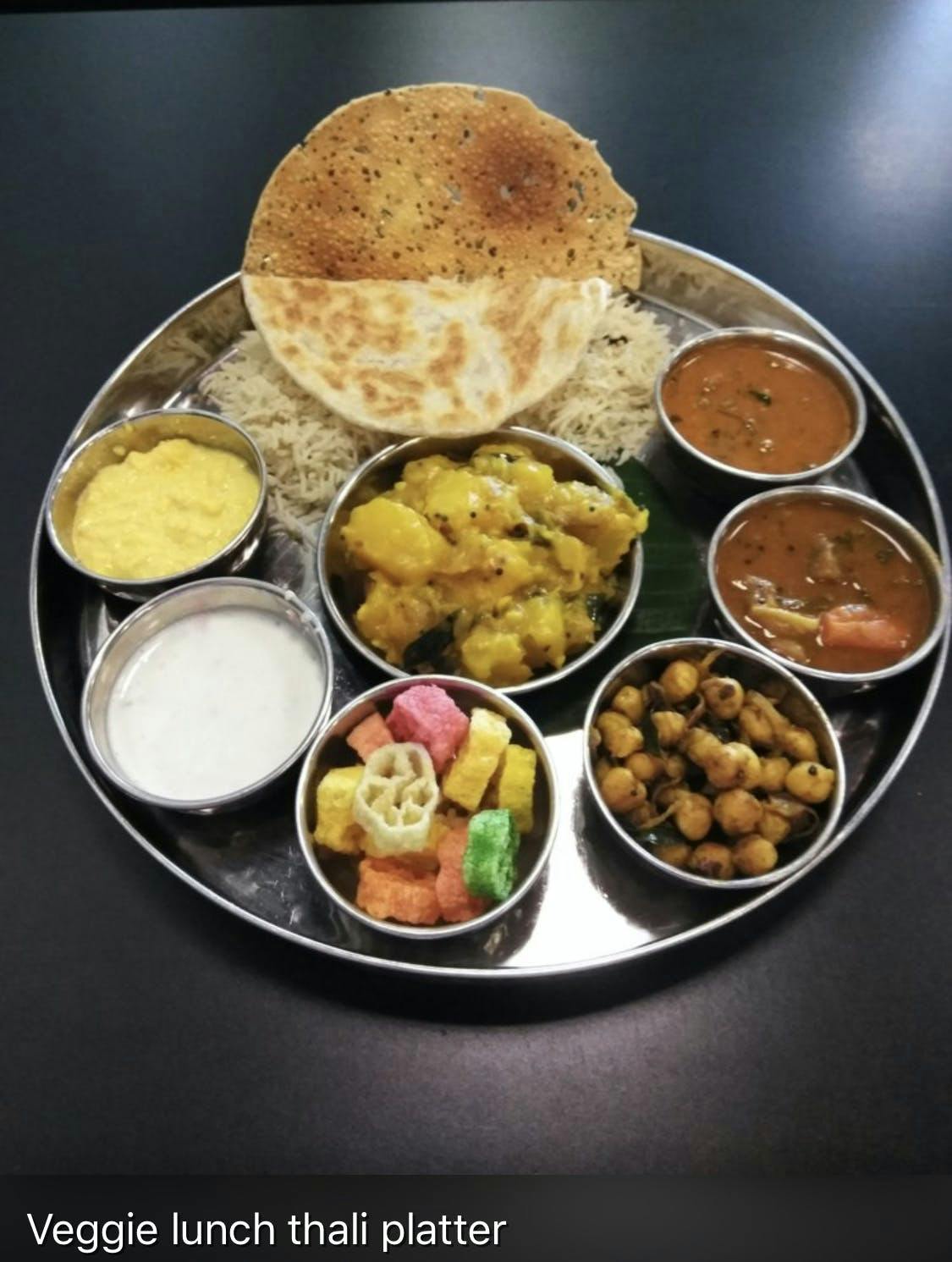 a bowl filled with different types of food on a table