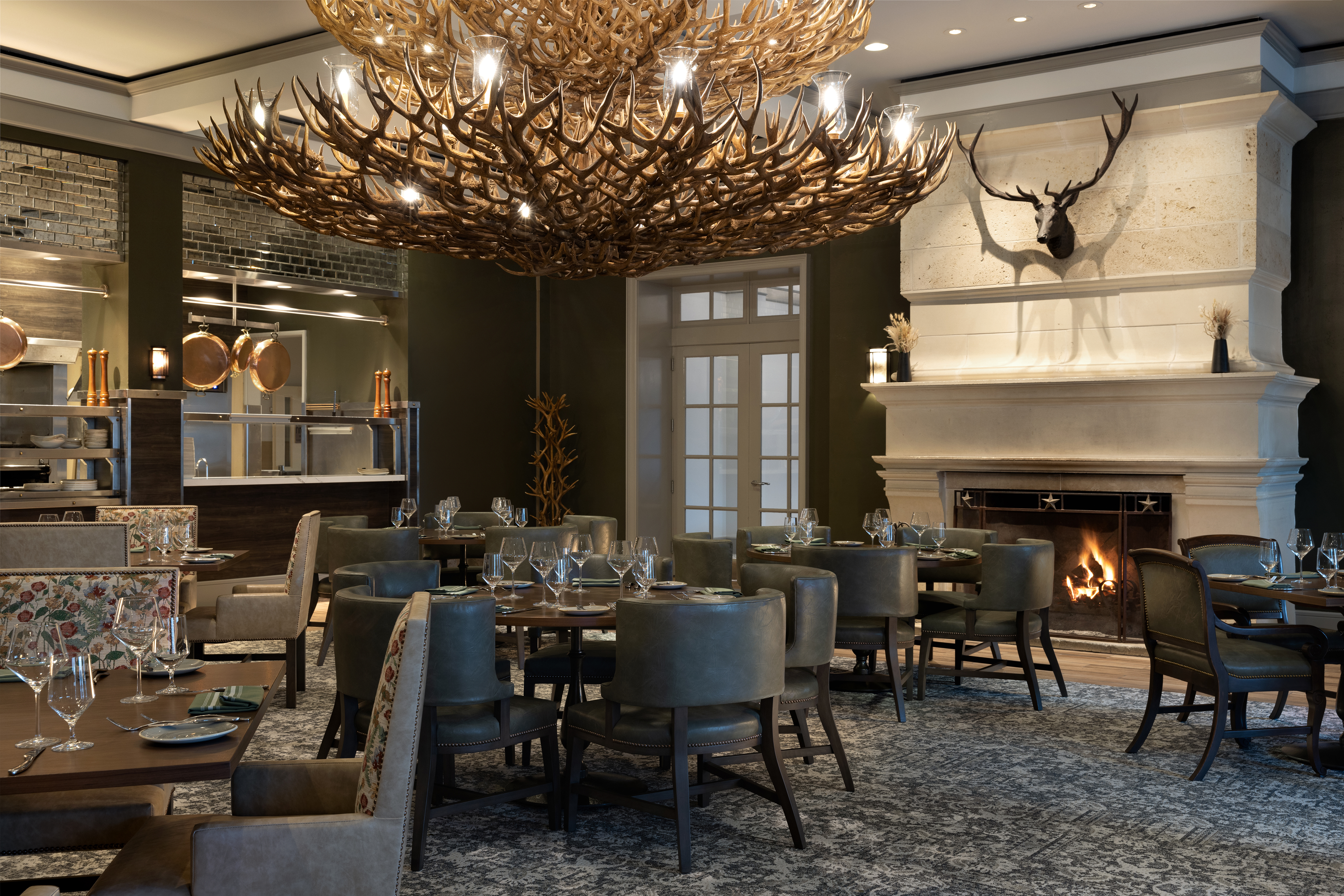 a room filled with furniture and vase on a table