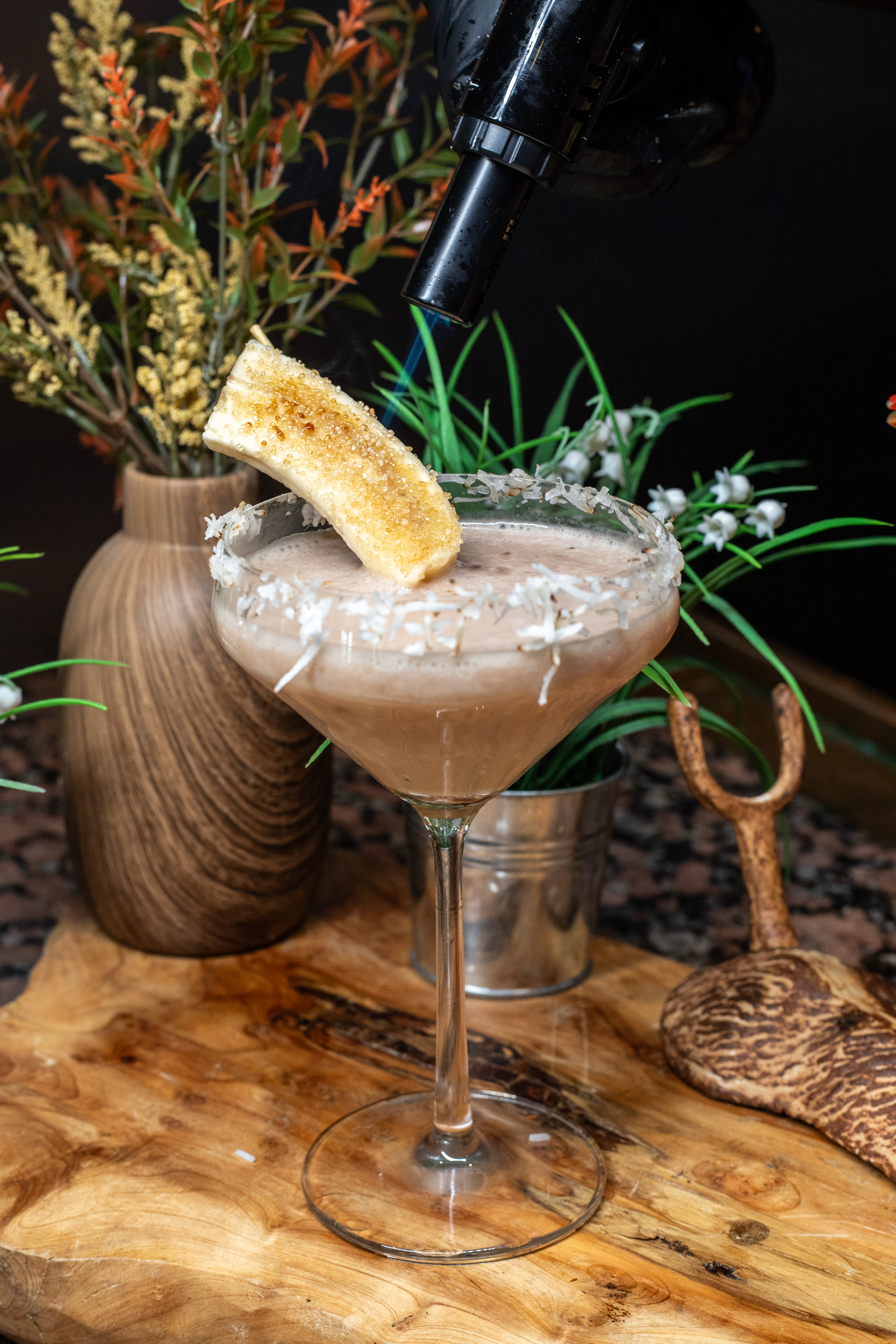 a glass of wine on a table