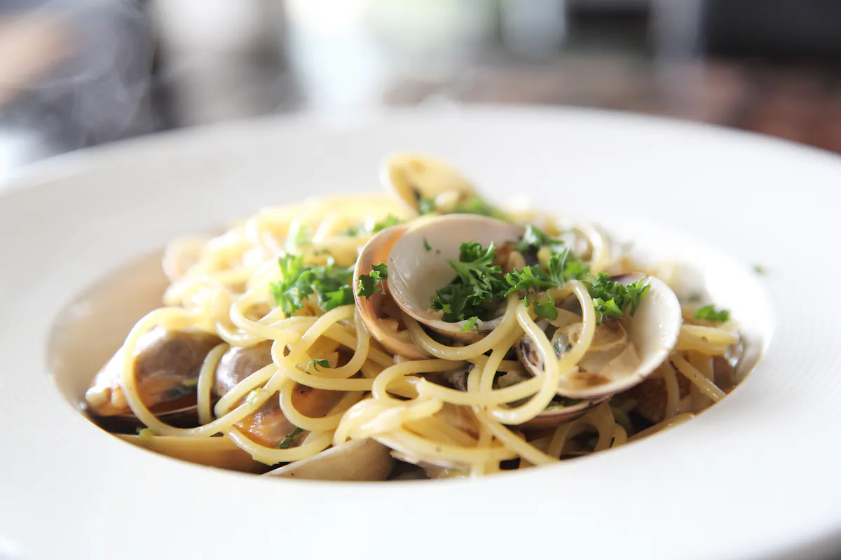 a plate of food with broccoli and pasta