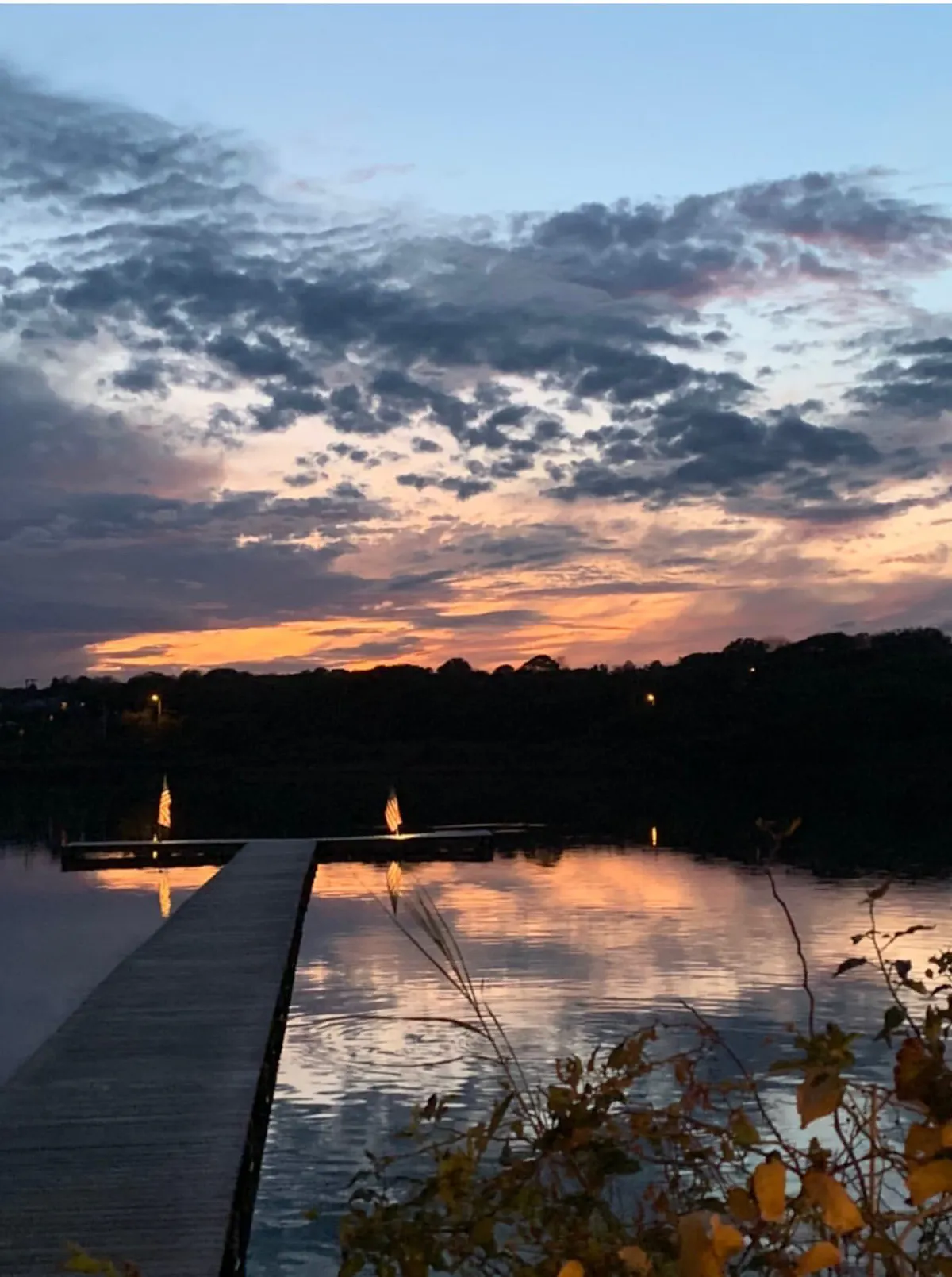 a sunset over a body of water