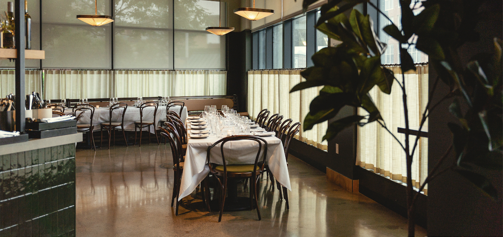 a room filled with furniture and a large window