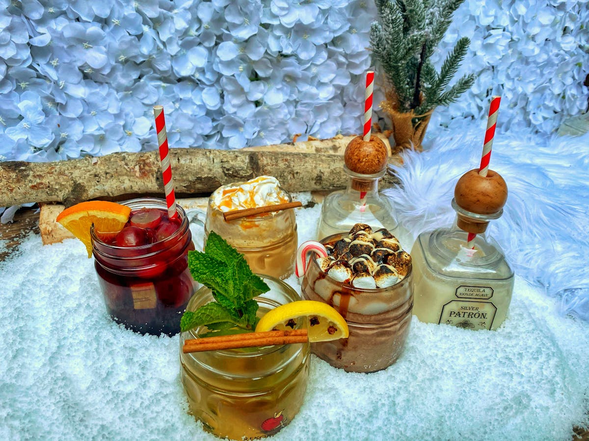 several cocktails sitting on a table