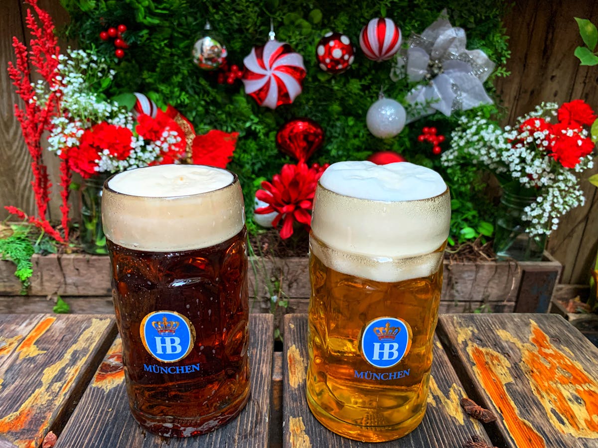 a cup of beer on a picnic table