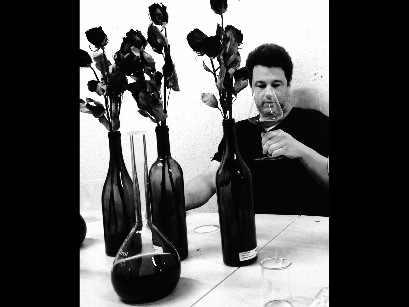 a man holding a bottle