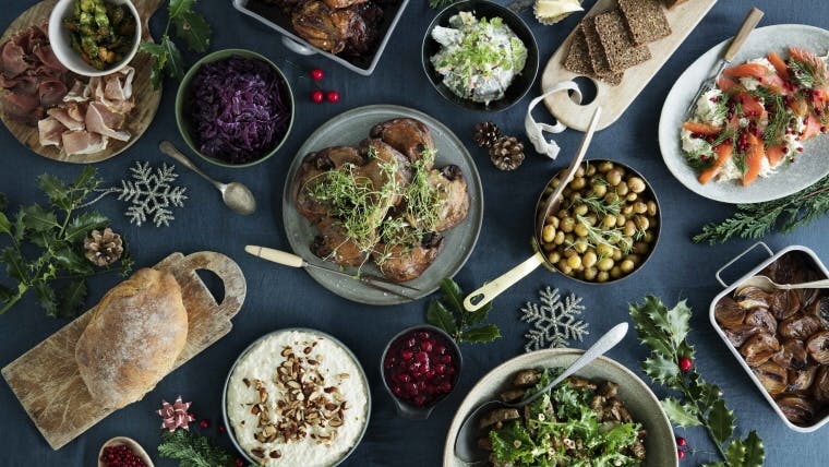 a bowl filled with different types of food on a table