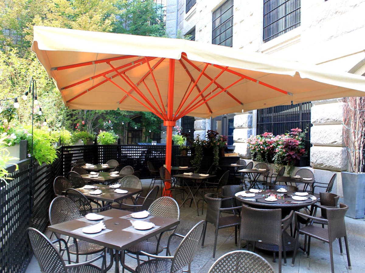 a dining table with umbrella