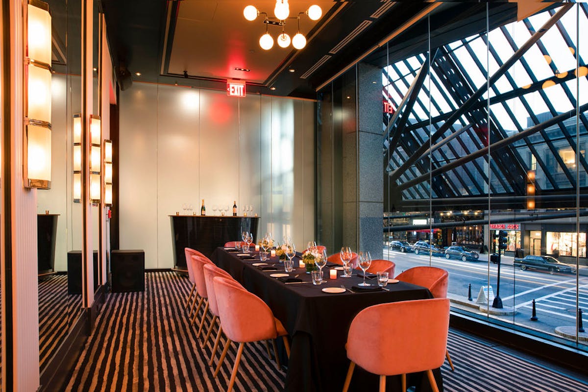 a dining room table in front of a building