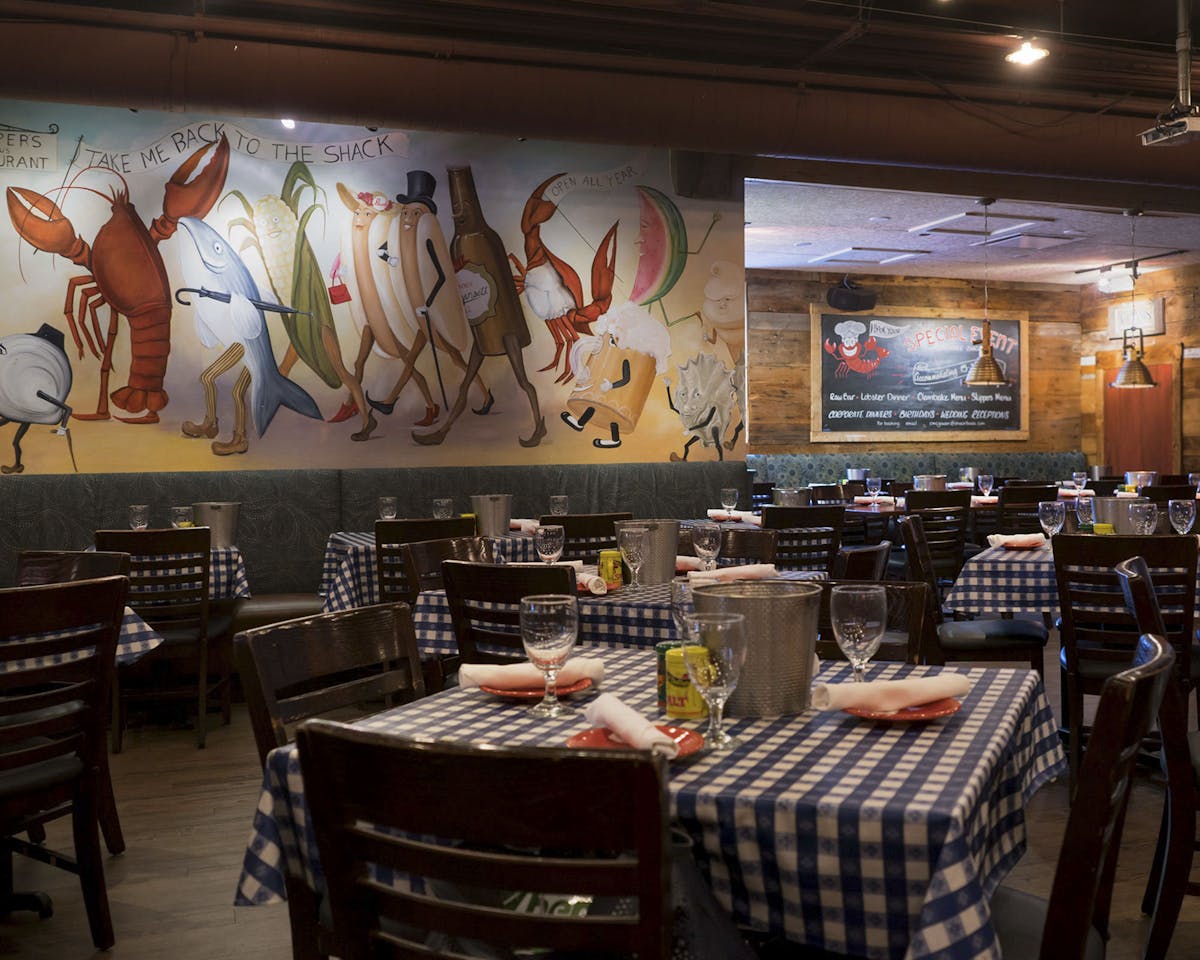 a room filled with furniture and a table in a restaurant