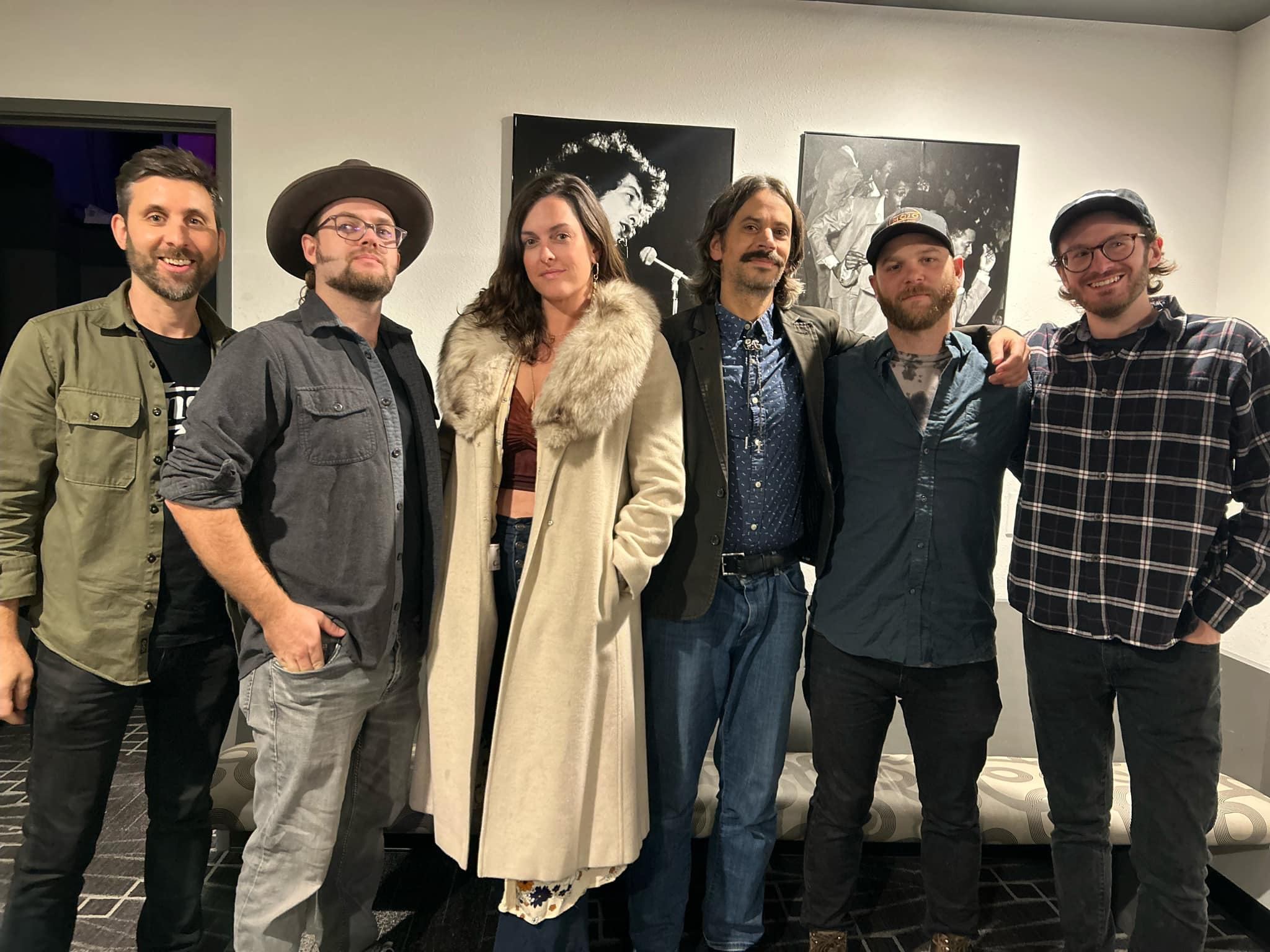 a group of people posing for a photo