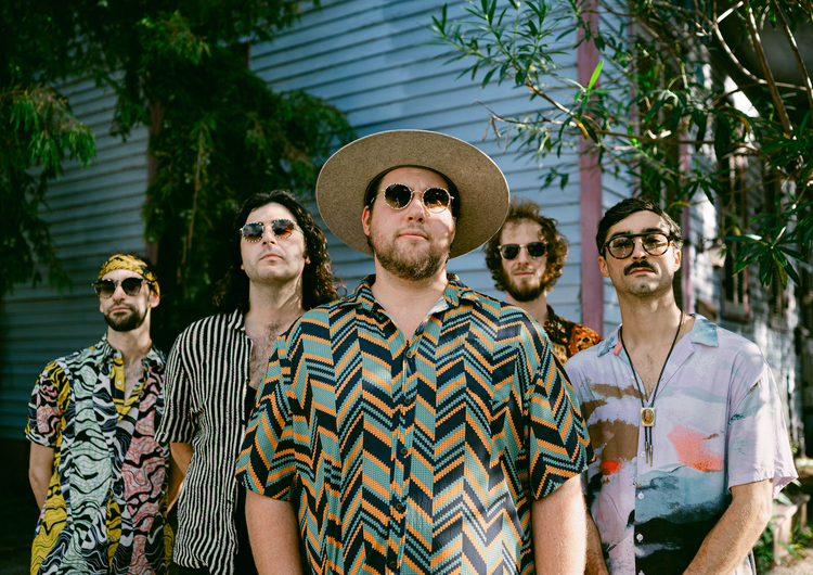 a group of people posing for the camera