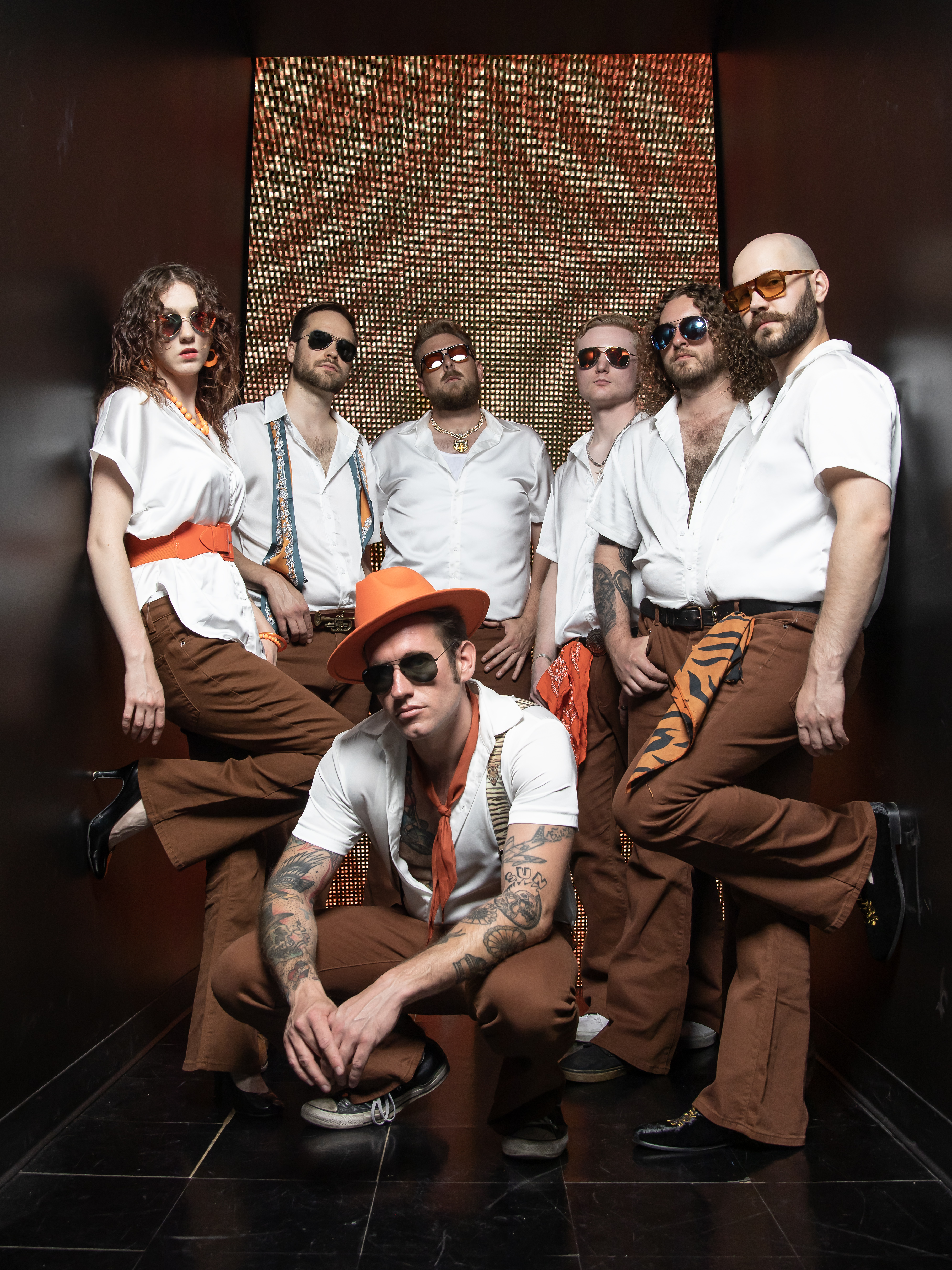 a group of people posing for a photo
