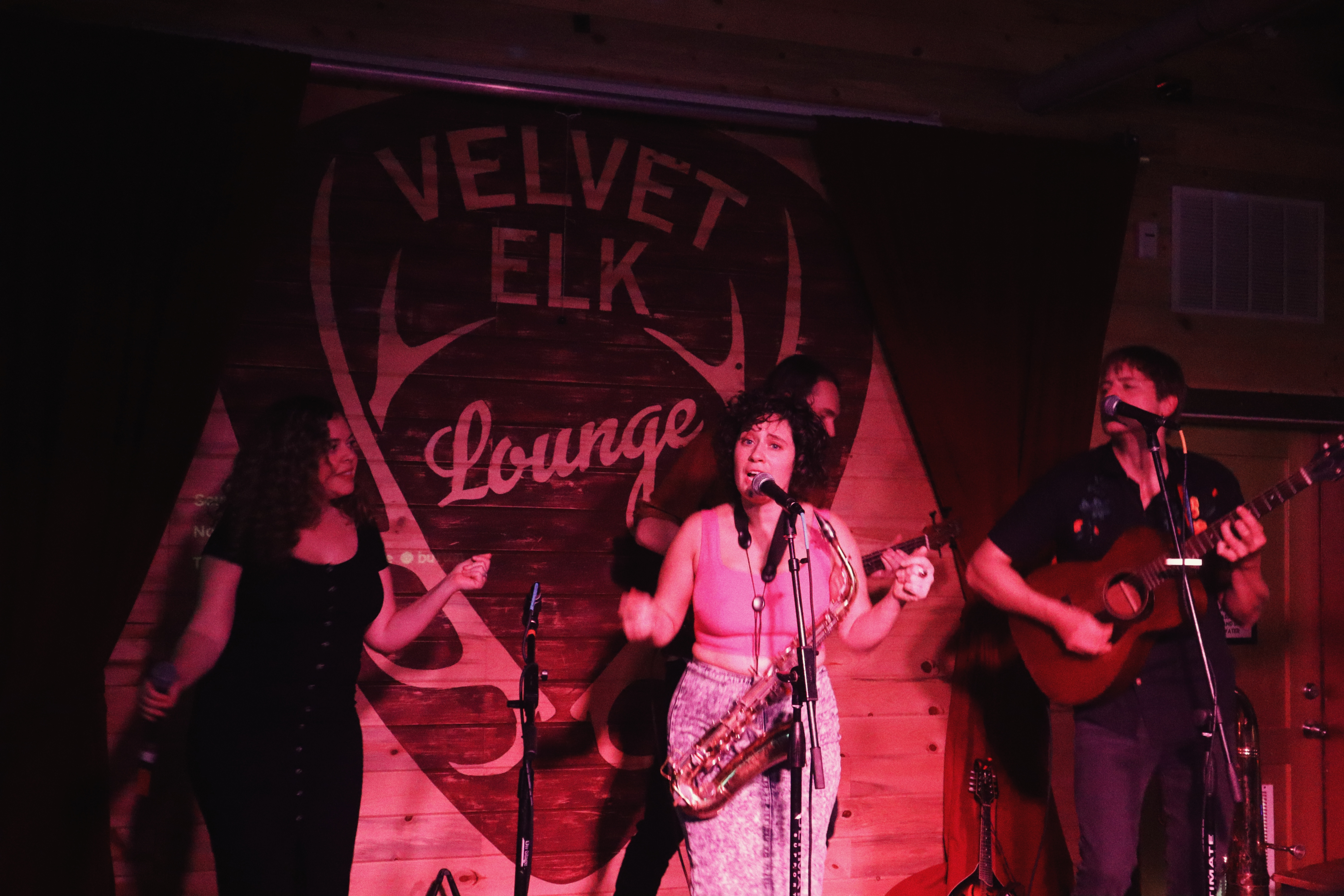 a group of people standing on a stage
