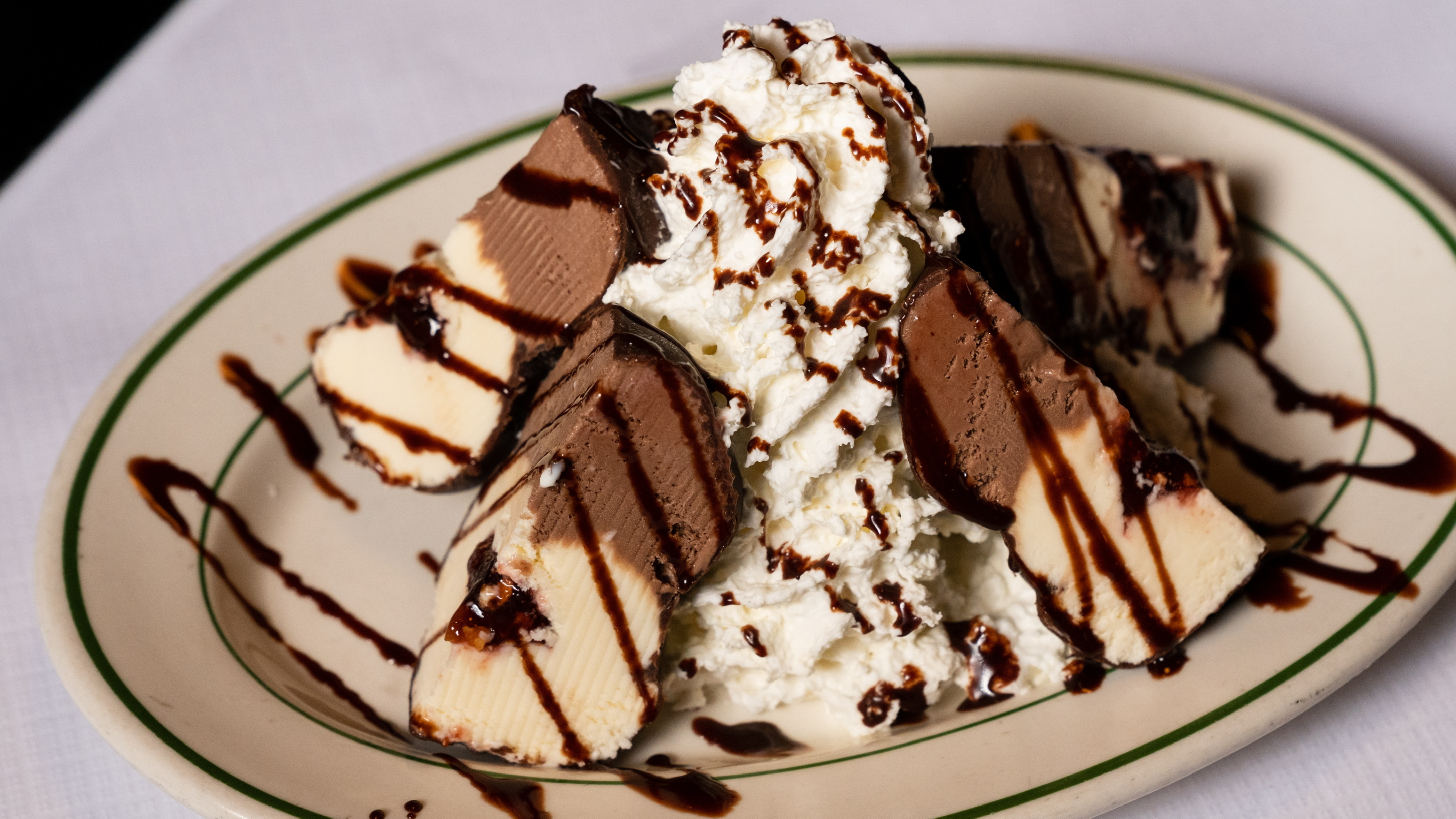 a piece of cake and ice cream on a plate