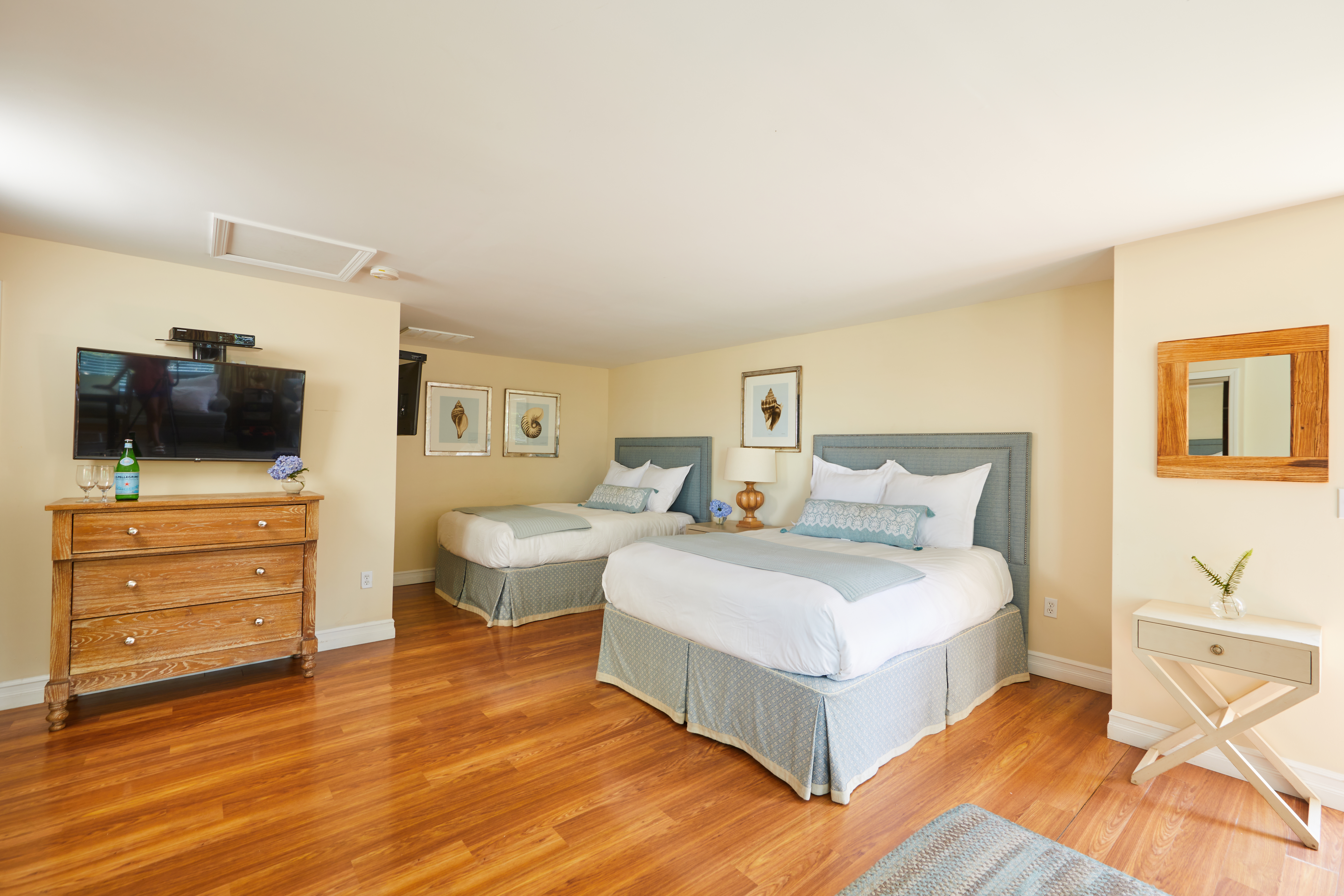 a room with two beds at a romantic getaway