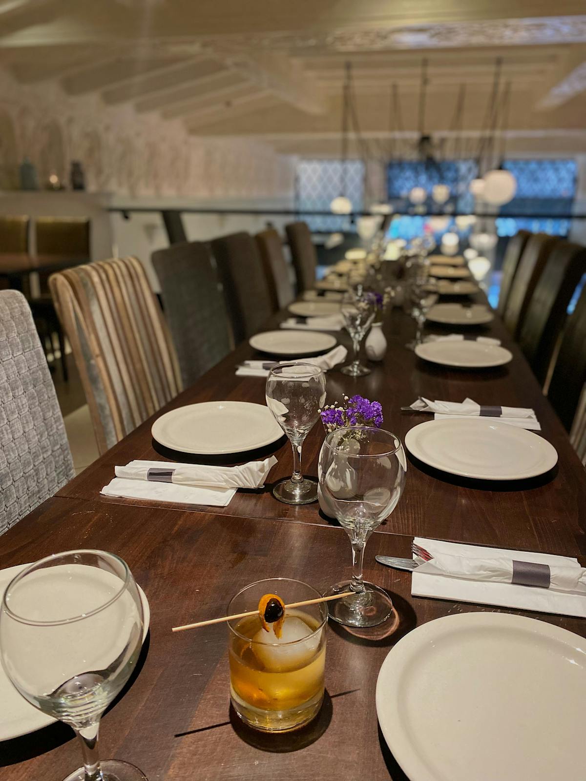 a dining table with wine glasses