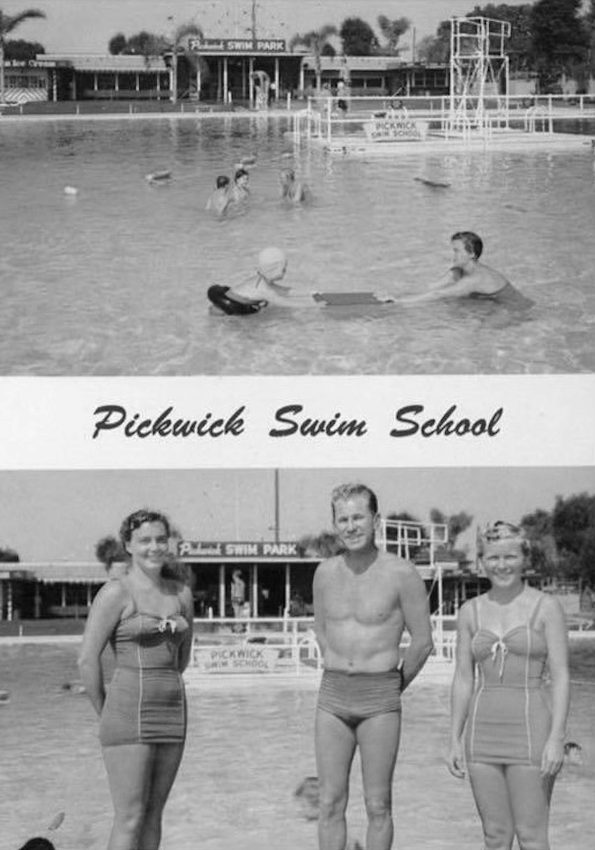 a group of people on a beach posing for the camera