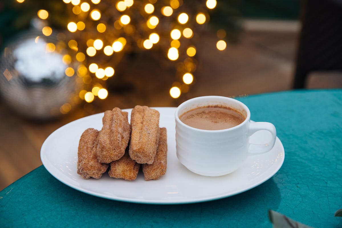 a plate of food and a cup of coffee