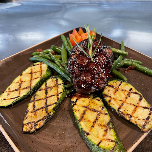 a plate of food with a knife