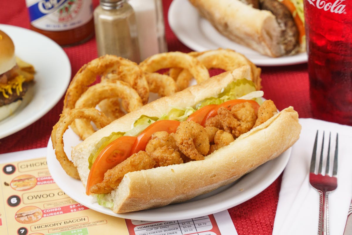 a close up of a plate of hot dogs