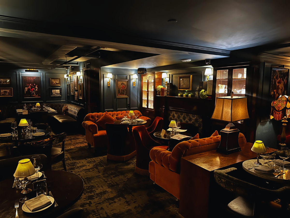 cozy couches and tables in cocktail bar