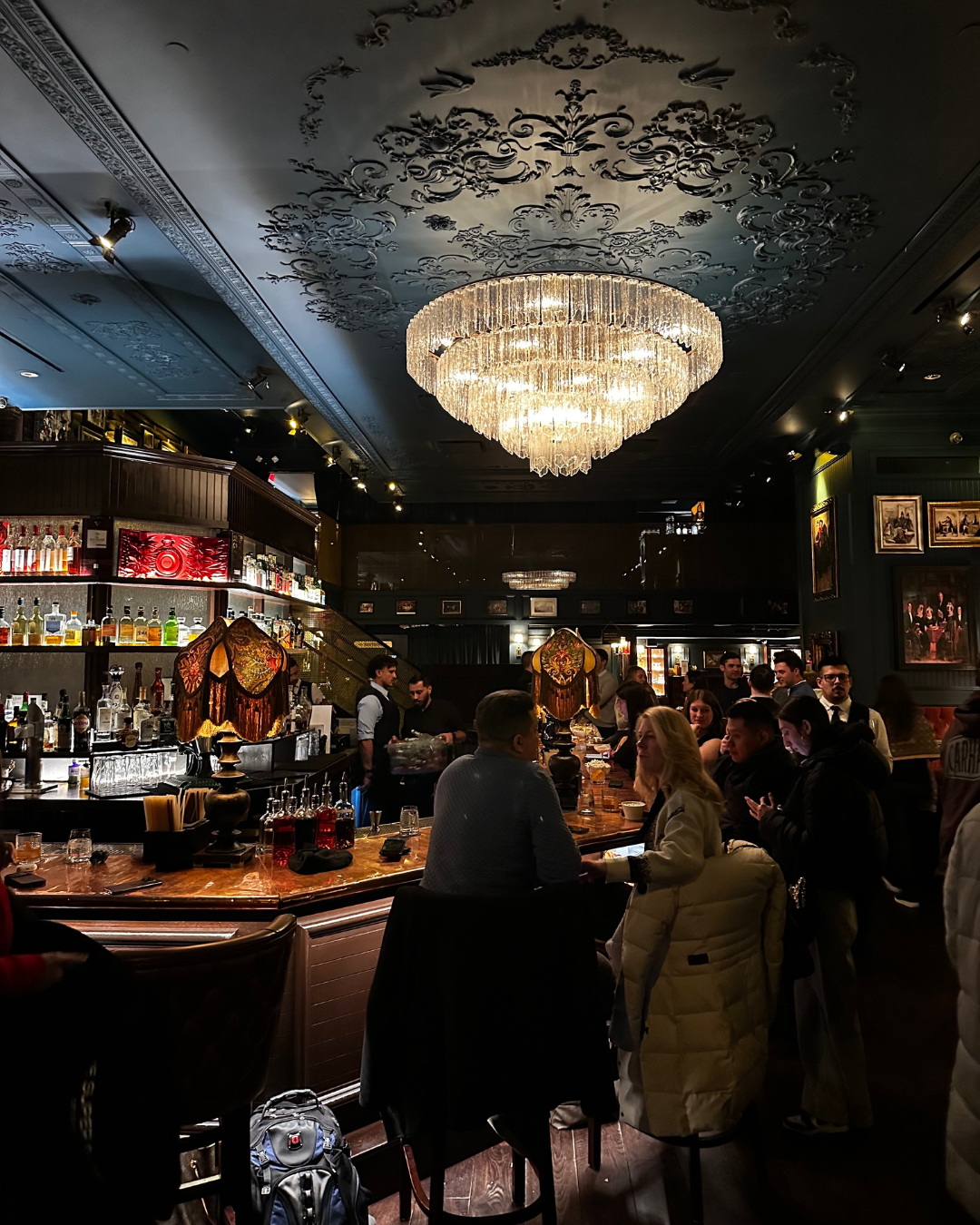 people sat at the bar in dining room