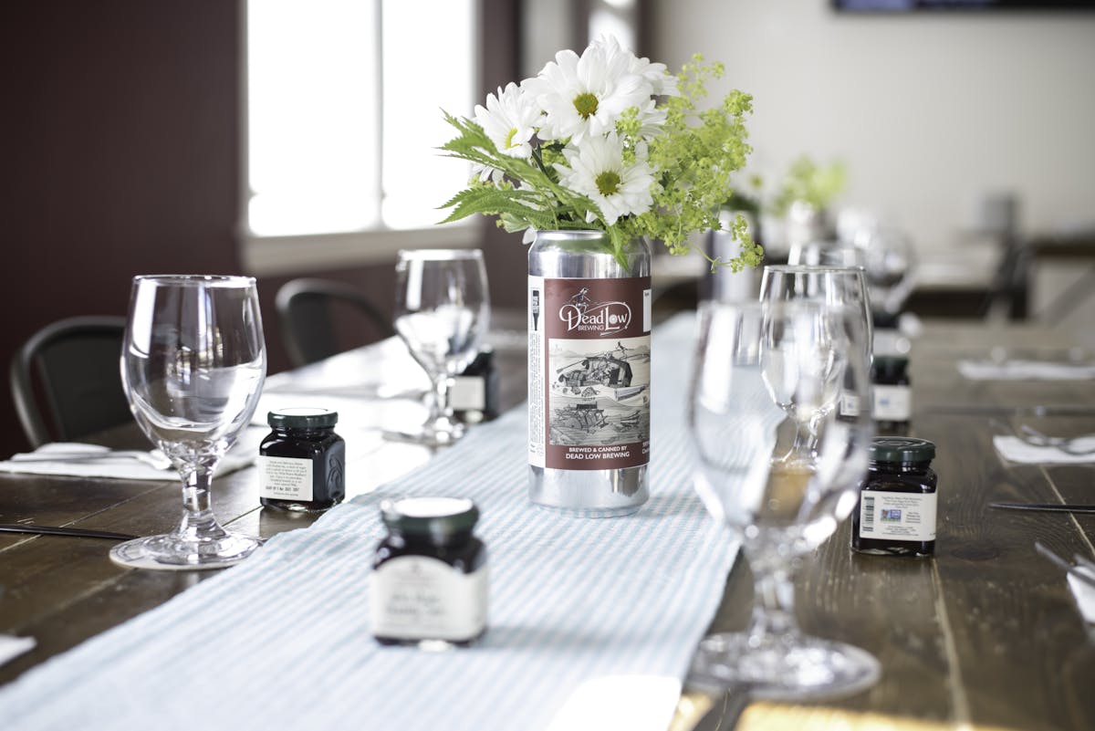 a table topped with glasses of wine