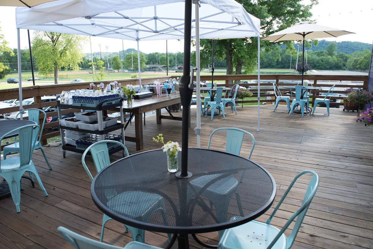a chair sittingthe Purple party deck at Dead Lowin front of a building