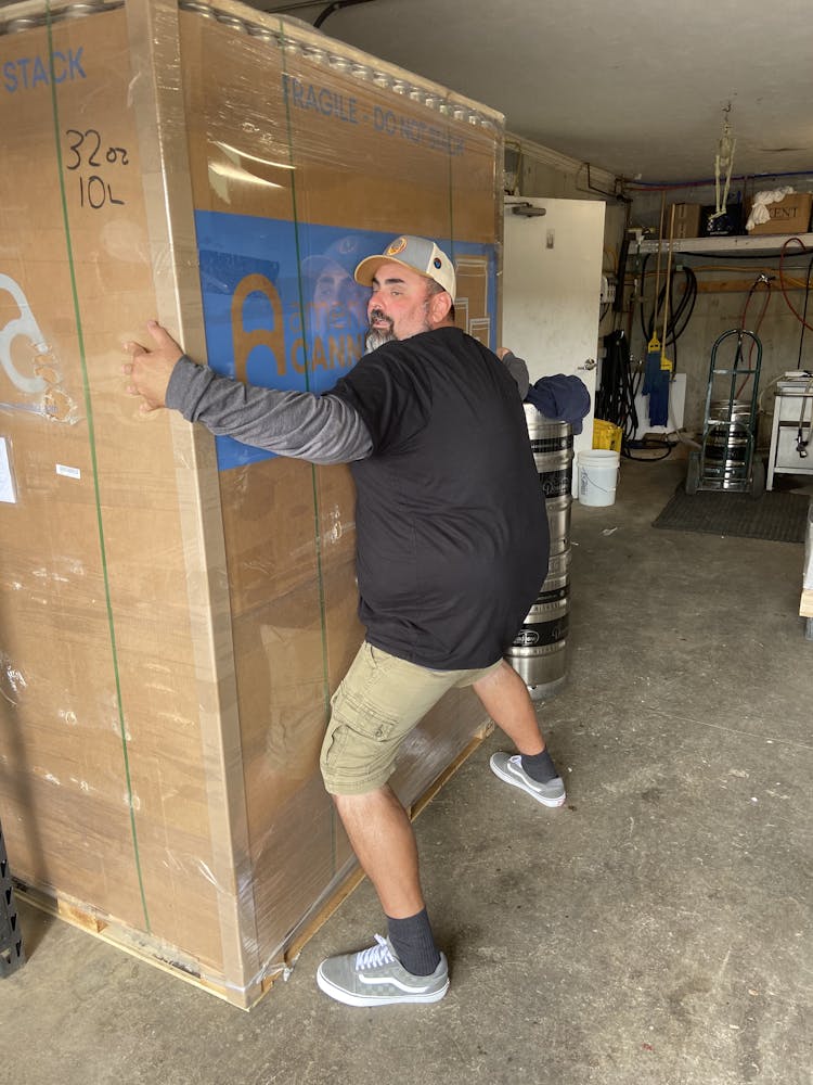 a man standing next to a door