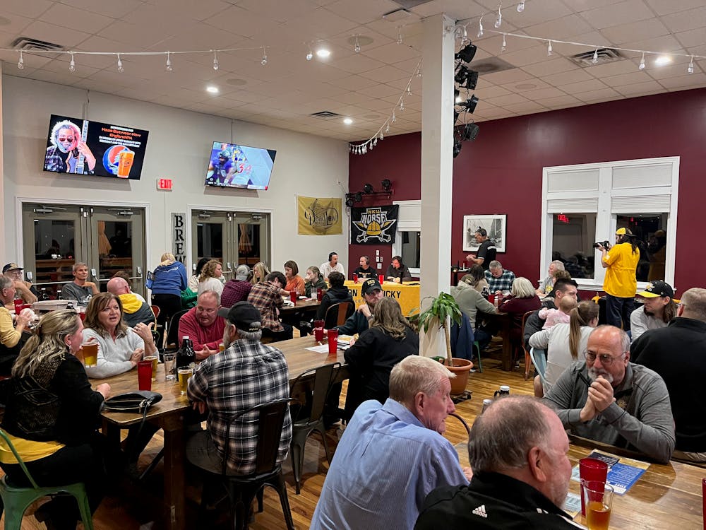 a group of people sitting at a table