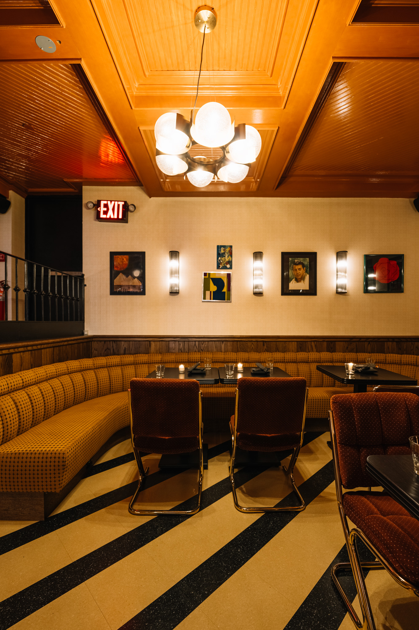 Candlelit restaurant corner with cushioned benches
