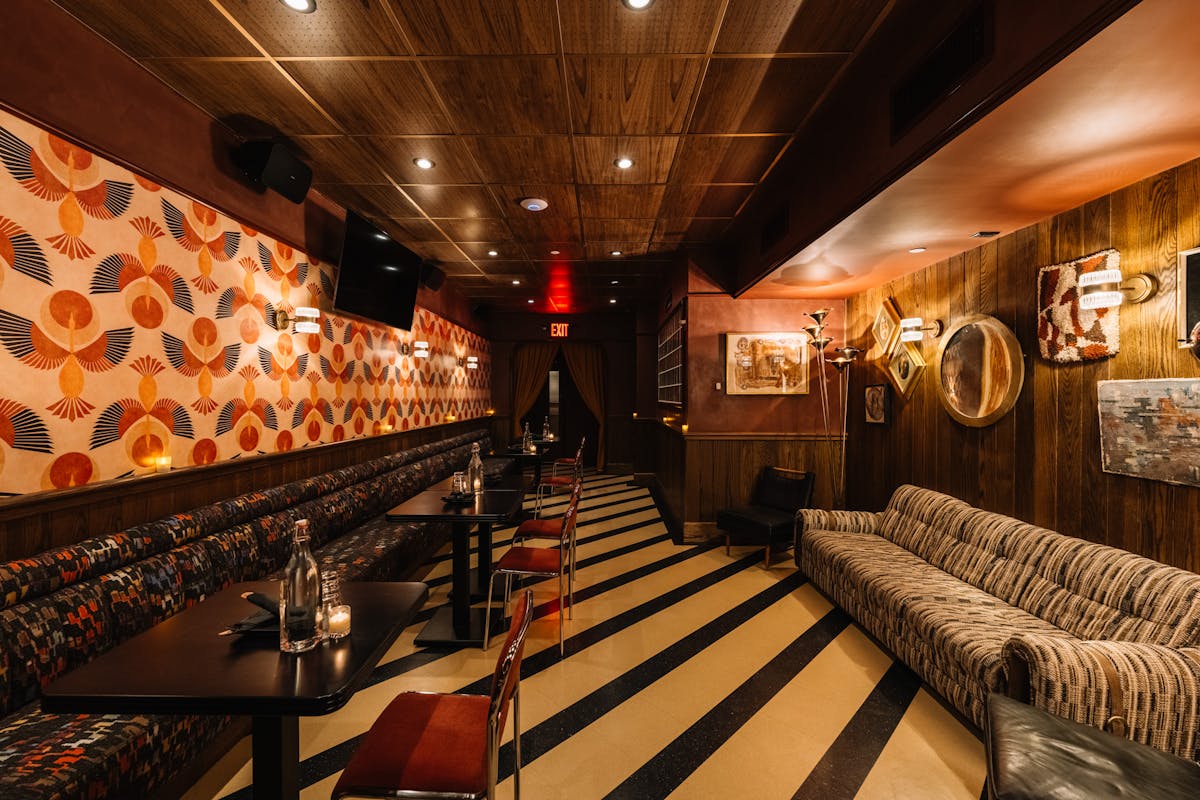 Chic bar interior featuring moody lighting