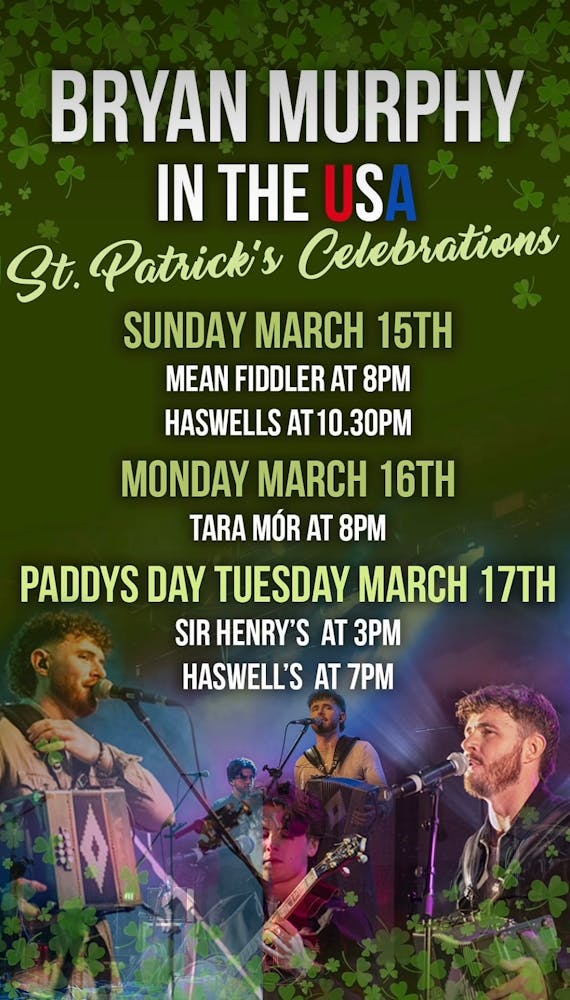 a group of men on stage with microphones