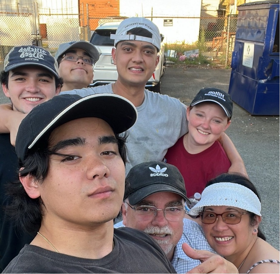 a group of people posing for the camera